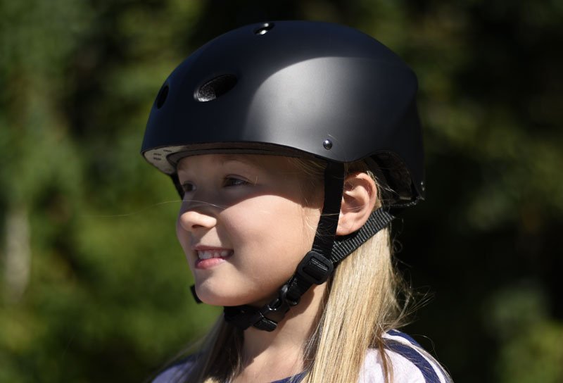 Skating enthusiast wearing a protective helmet.