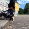 A skater performing a stylish jump on inline skates, demonstrating beginner-friendly rollerblading tricks for an exciting and enjoyable skating experience