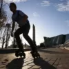 Comparison between street skating and park skating: Street skater navigating urban obstacles, while park skater performs precision tricks on purpose-built ramps