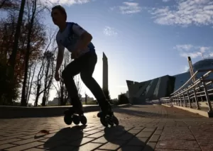 Comparison between street skating and park skating: Street skater navigating urban obstacles, while park skater performs precision tricks on purpose-built ramps