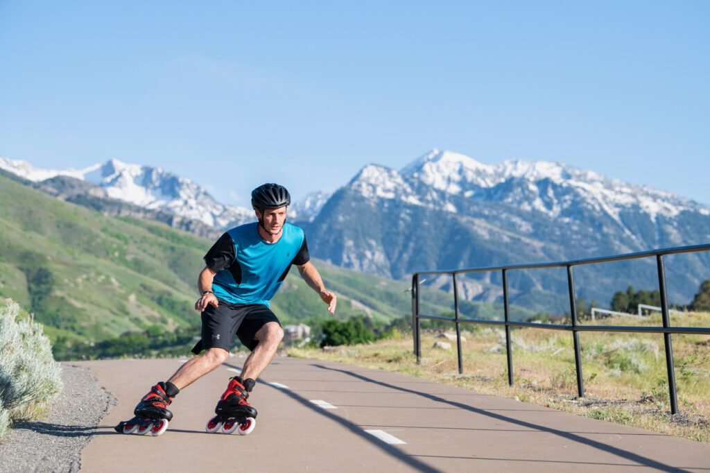 Inline skater confidently descending a hill, demonstrating downhill skating skills
