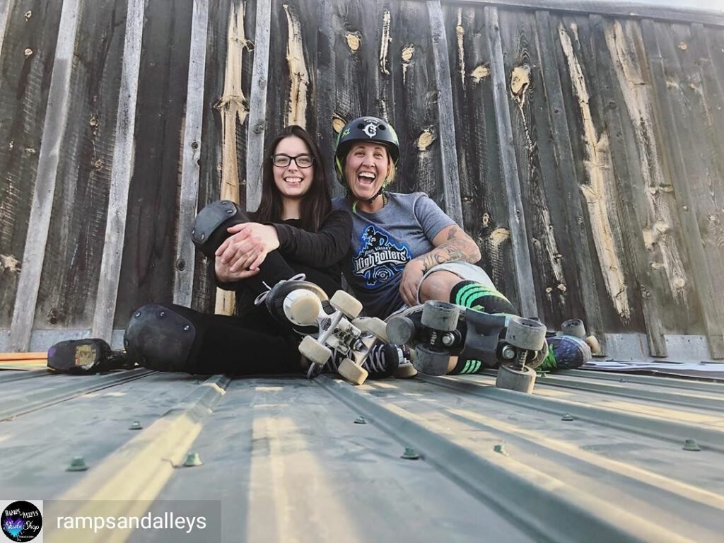 A person wearing inline skates glides smoothly on a paved trail, demonstrating the therapeutic benefits of inline skating in physical rehabilitation.