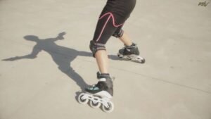 A person performing a T-stop on inline skates, dragging one foot perpendicular to their direction of travel to slow down